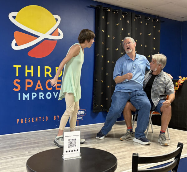 Students sitting in Third Space Improv