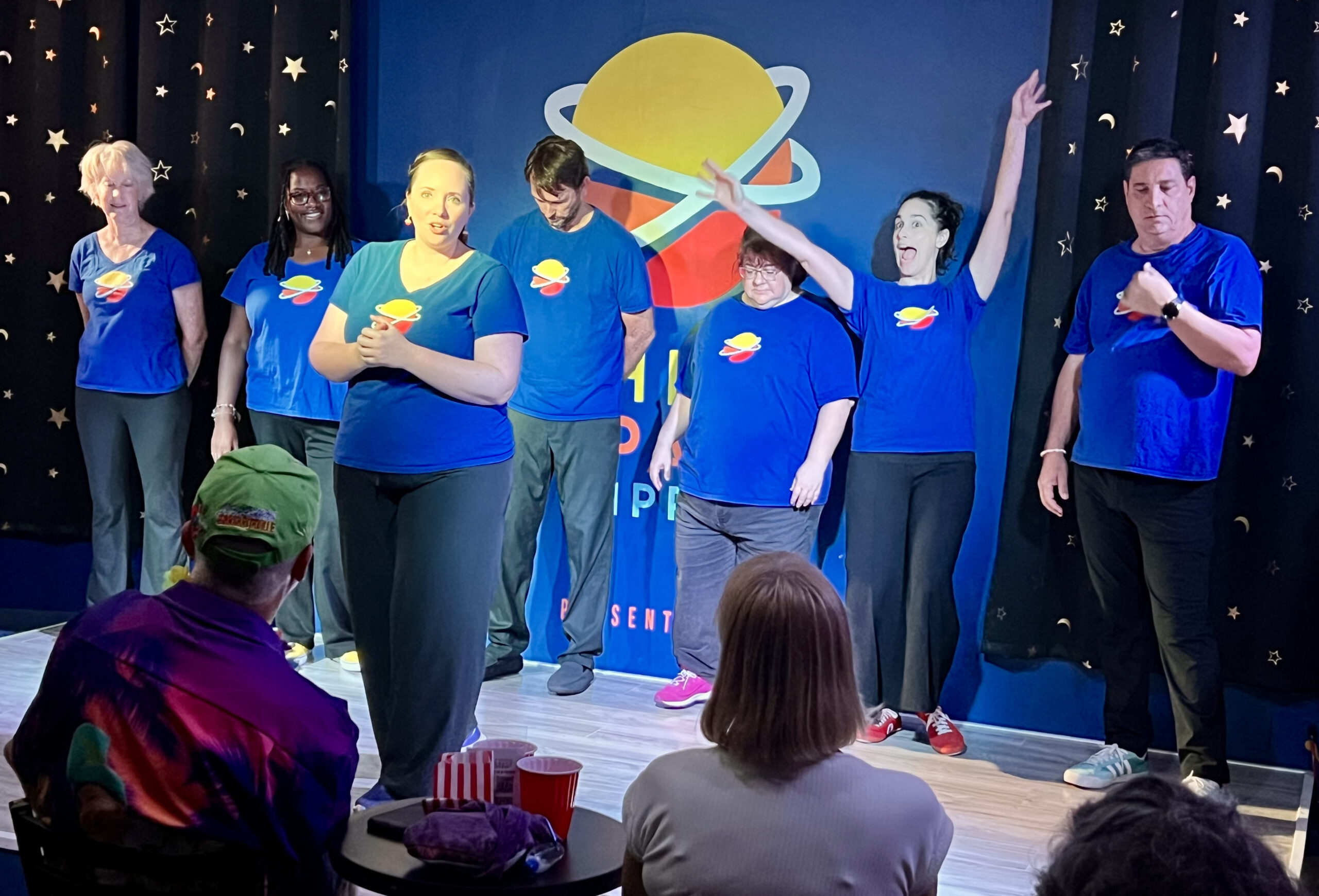 Performers entertain audience members at Third Space Improv in St. Augustine.