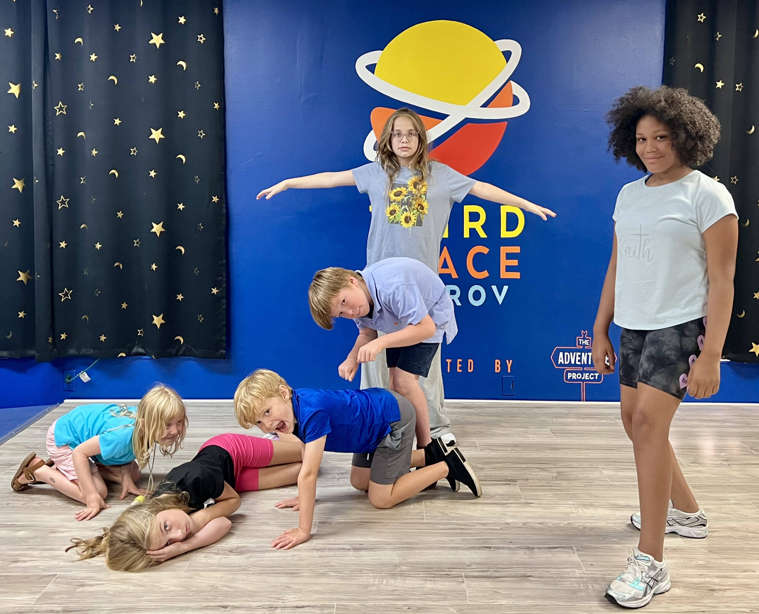 Kids playing at Third Space Improv's summer camp